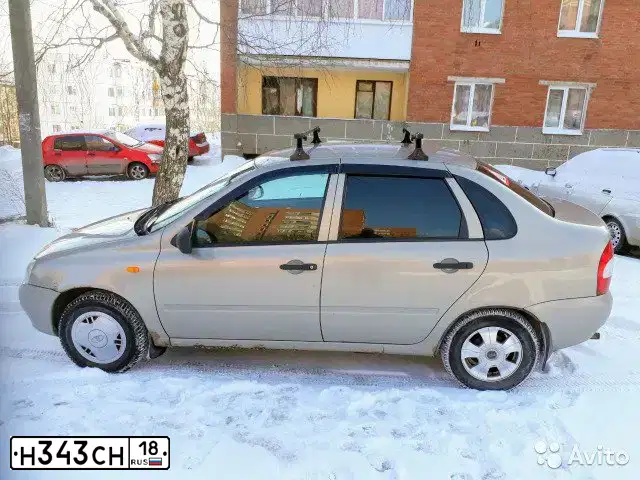 Фото автомобиля LADA 1118 KALINA, 2006 — госномер К023ЕТ18. Цвет: БЕЖЕВО-СЕРЫЙ