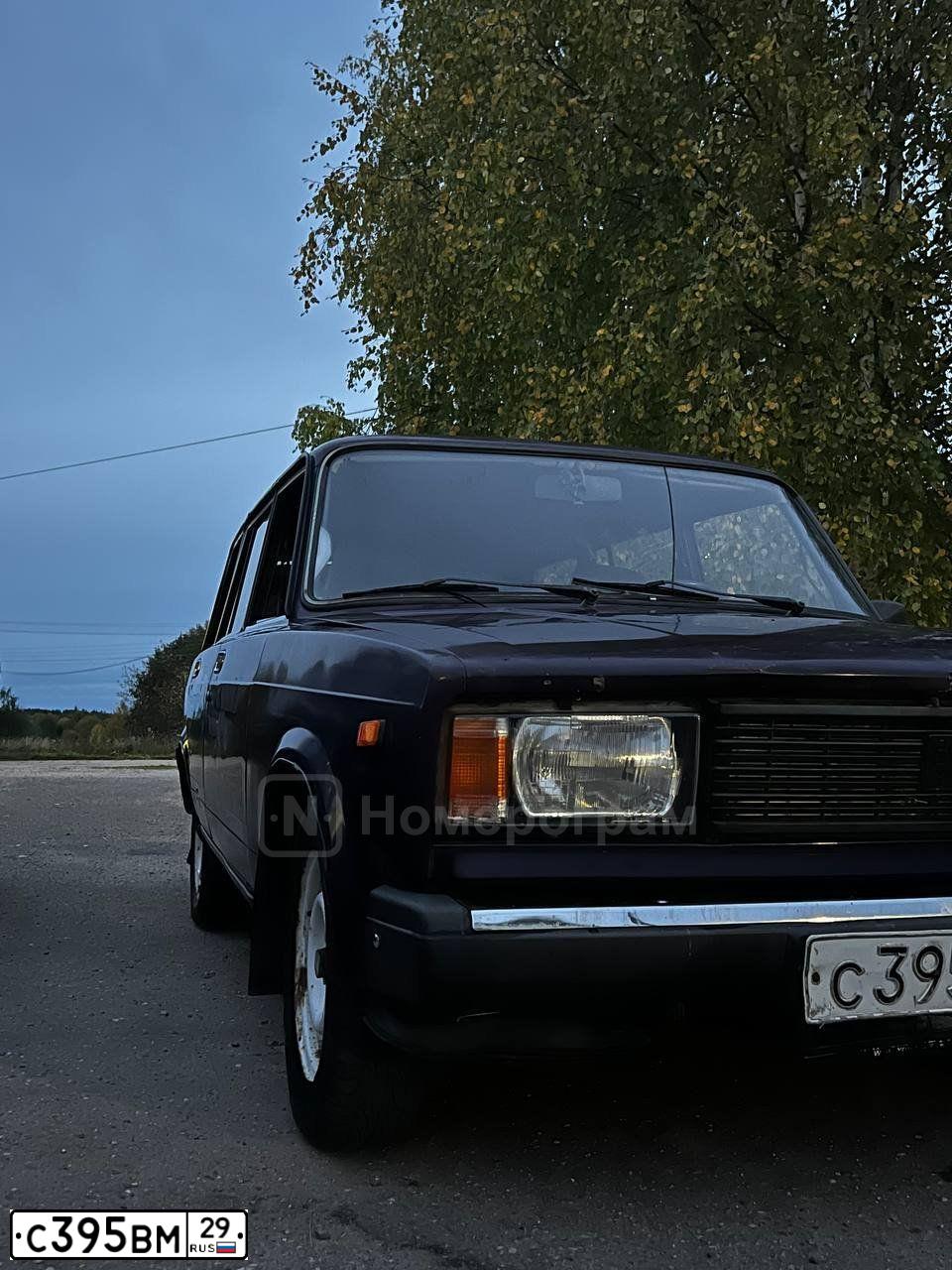 Фото автомобиля LADA 2104, 2003 — госномер С395ВМ29. Цвет: ФИОЛЕТОВЫЙ