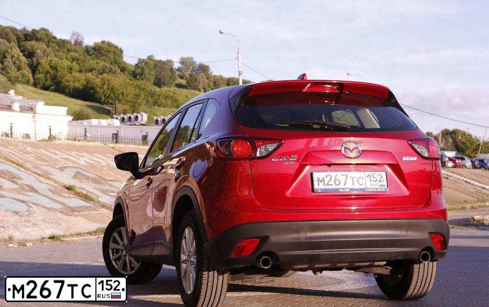 Фото автомобиля MAZDA CX-5, 2013 — госномер Р735АК152. Цвет: Красный