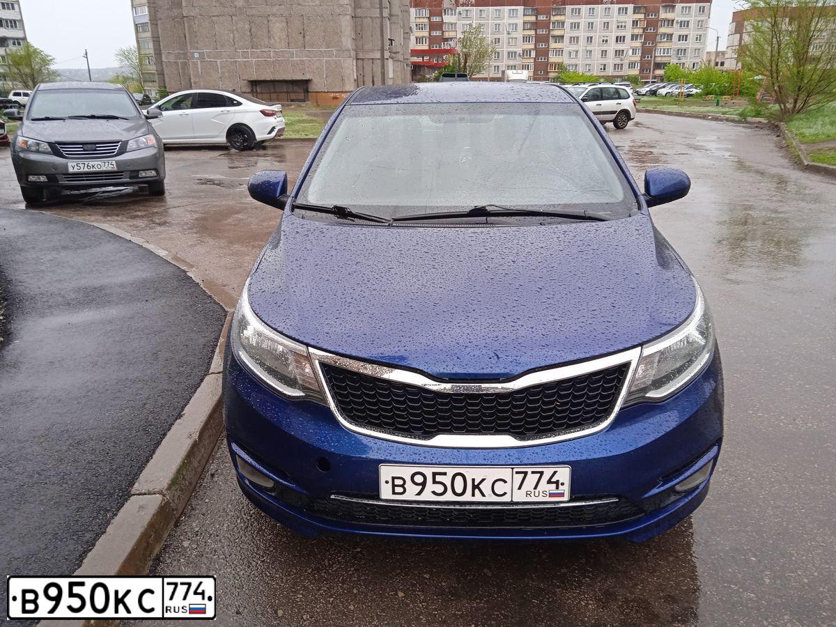 Фото автомобиля KIA RIO, 2016 — госномер В950КС774. Цвет: ТЕМНО-СИНИЙ