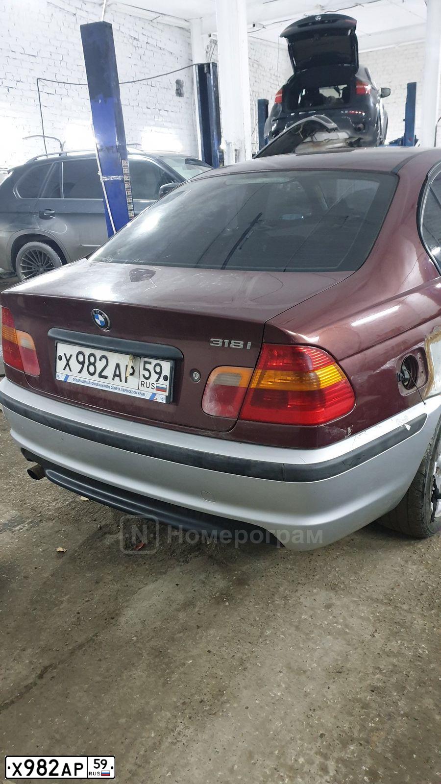 Фото автомобиля BMW SERIE 3, 2003 — госномер Х982АР59. Цвет: КРАСНЫЙ