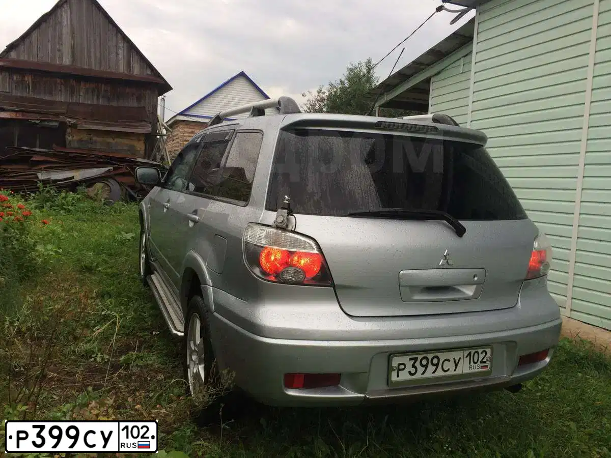 Фото автомобиля MITSUBISHI OUTLANDER, 2005 — госномер Р399СУ102. Цвет: СЕРЕБРИСТЫЙ