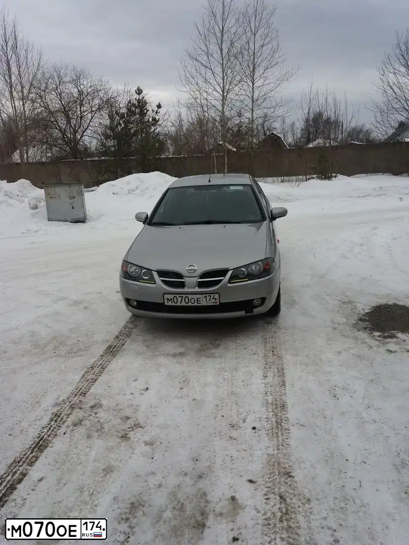 Фото автомобиля NISSAN ALMERA, 2005 — госномер М070ОЕ174. Цвет: Серебристый