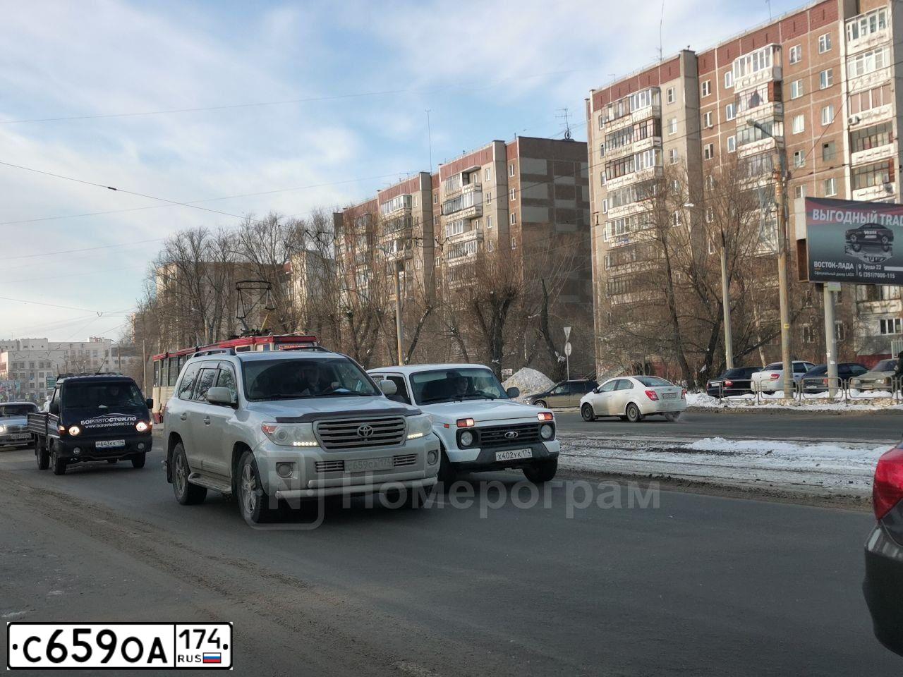 Фото автомобиля DAF F XF 105 FT 4X2, 2008 — госномер С612ОА174. Цвет: ТЕМНО-СИНИЙ