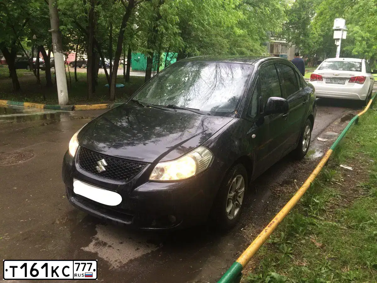 Фото автомобиля CHEVROLET CRUZE, 2014 — госномер Т161КС777. Цвет: Белый