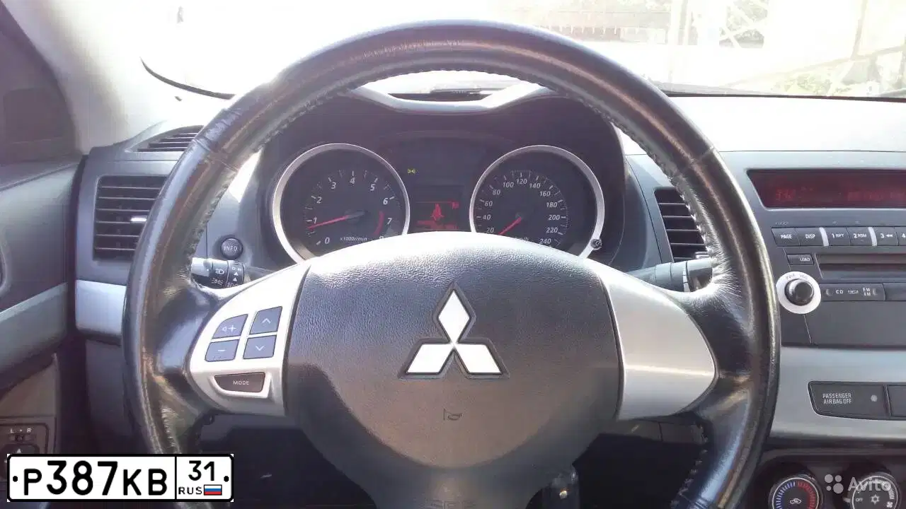 Фото автомобиля MITSUBISHI LANCER, 2010 — госномер Р387КВ31. Цвет: СИНИЙ