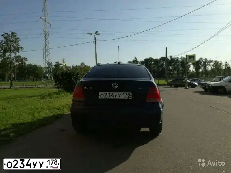 Фото автомобиля VOLKSWAGEN BORA, 1998 — госномер Т349ОТ98. Цвет: ТЕМНО-СИНИЙ