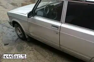 Фото автомобиля LADA 2104 LADA, 2006 — госномер К445ХС98. Цвет: СЕРЕБРИСТЫЙ