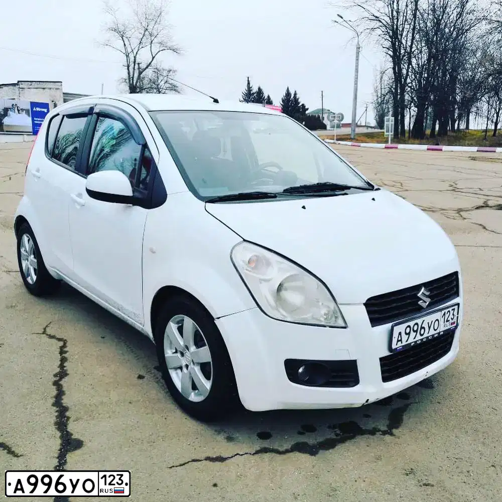 Фото автомобиля SUZUKI SPLASH, 2009 — госномер А996УО123. Цвет: Белый