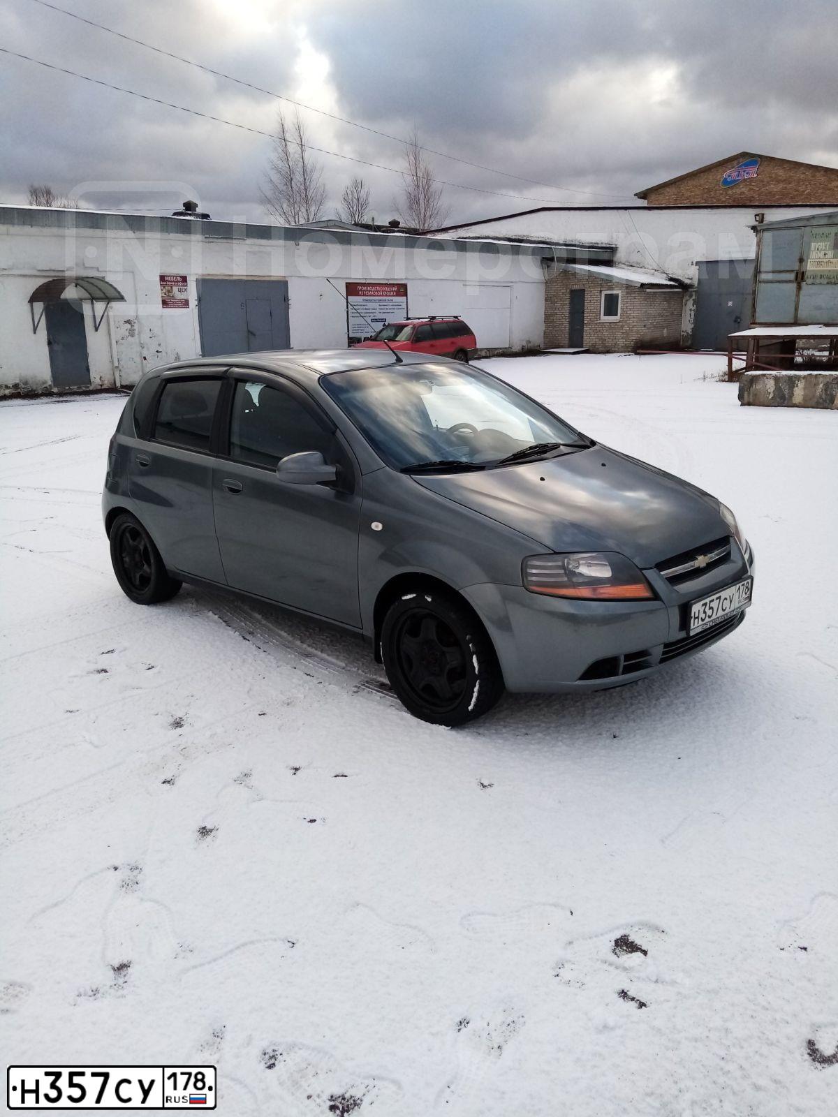 Фото автомобиля CHEVROLET AVEO, 2007 — госномер Н357СУ178. Цвет: СЕРЫЙ