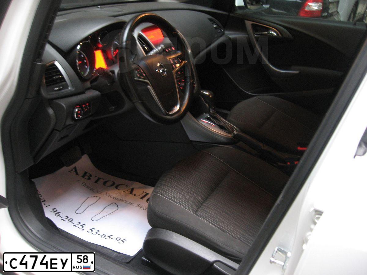 Фото автомобиля OPEL ASTRA, 2012 — госномер М189СС13. Цвет: Белый