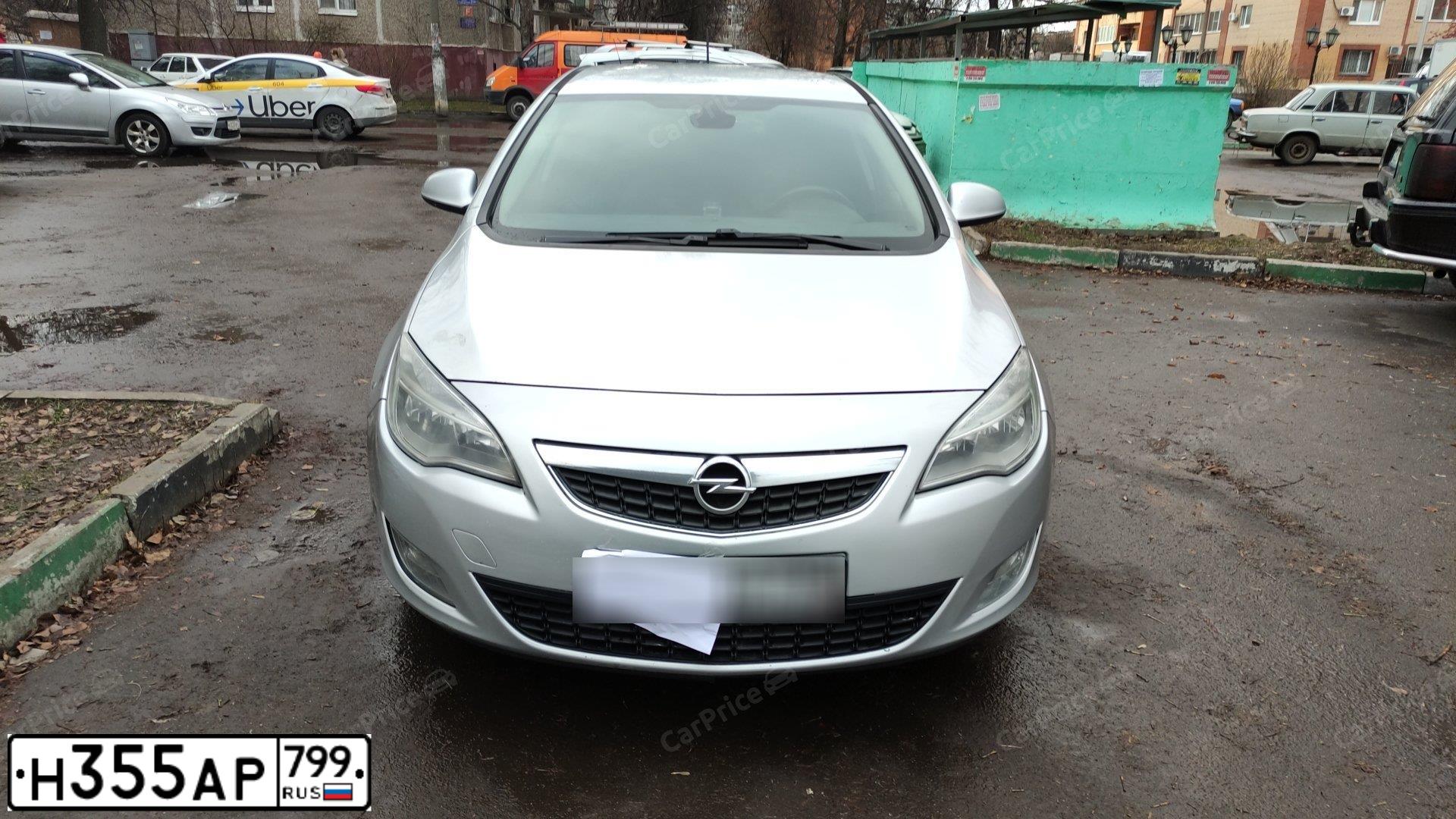 Фото автомобиля OPEL ASTRA, 2010 — госномер Н355АР799. Цвет: СЕРЕБРИСТЫЙ МЕТАЛИК