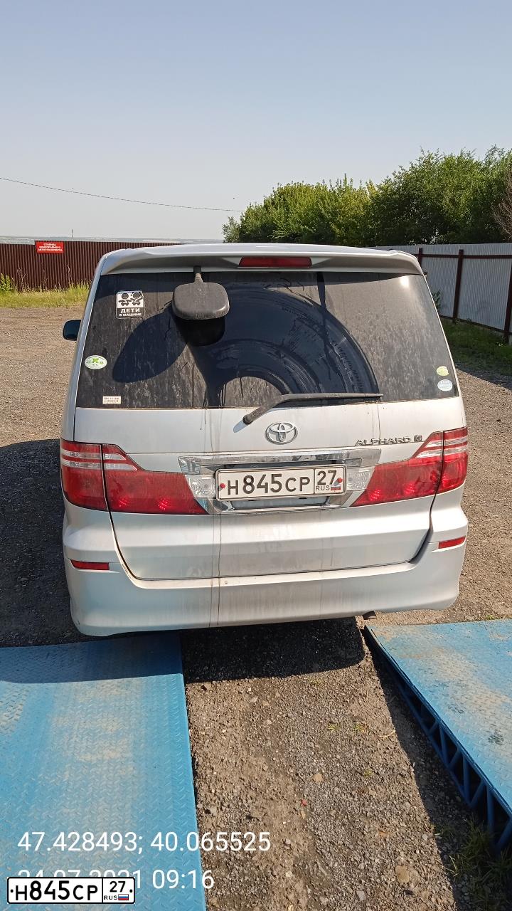 Фото автомобиля MITSUBISHI L 200, 2012 — госномер О857ТР125. Цвет: СЕРЕБРИСТЫЙ