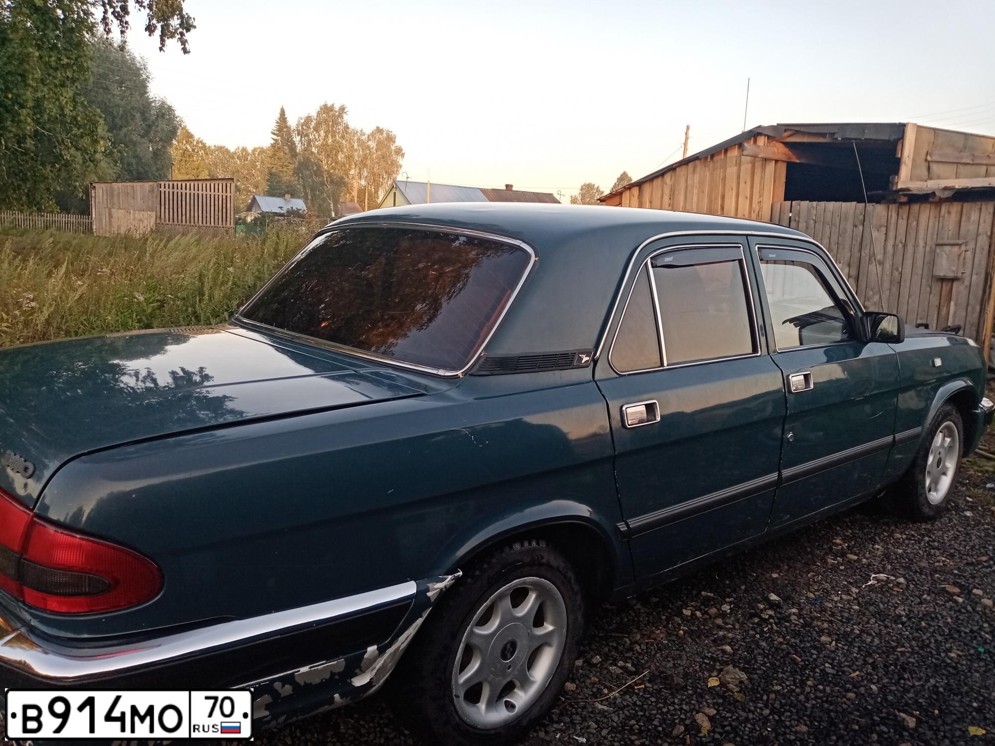 Фото автомобиля GAZ 3110 WOLGA, 2001 — госномер Е418РВ70. Цвет: Сине-зеленый