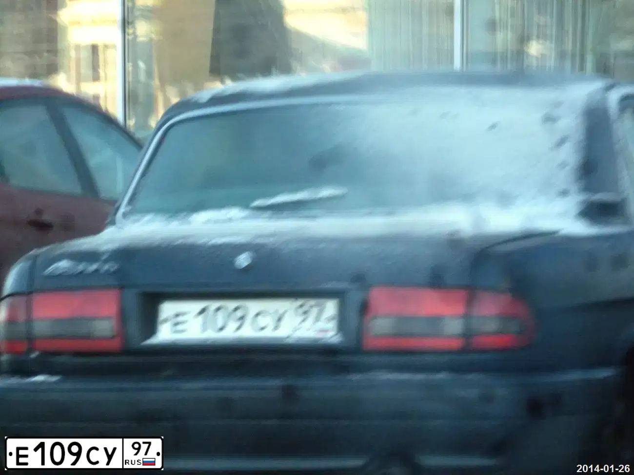 Фото автомобиля GAZ 3110 WOLGA, 2004 — госномер Е109СУ97. Цвет: ЧЕРНЫЙ