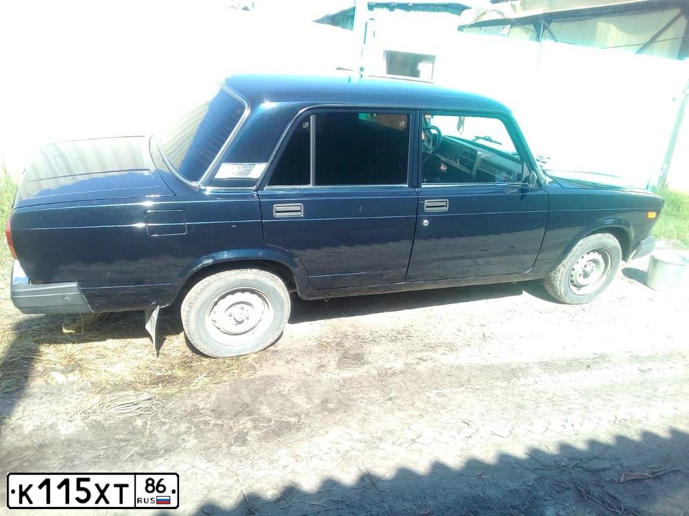 Фото автомобиля LADA 2107, 2012 — госномер Н569СМ70. Цвет: синий