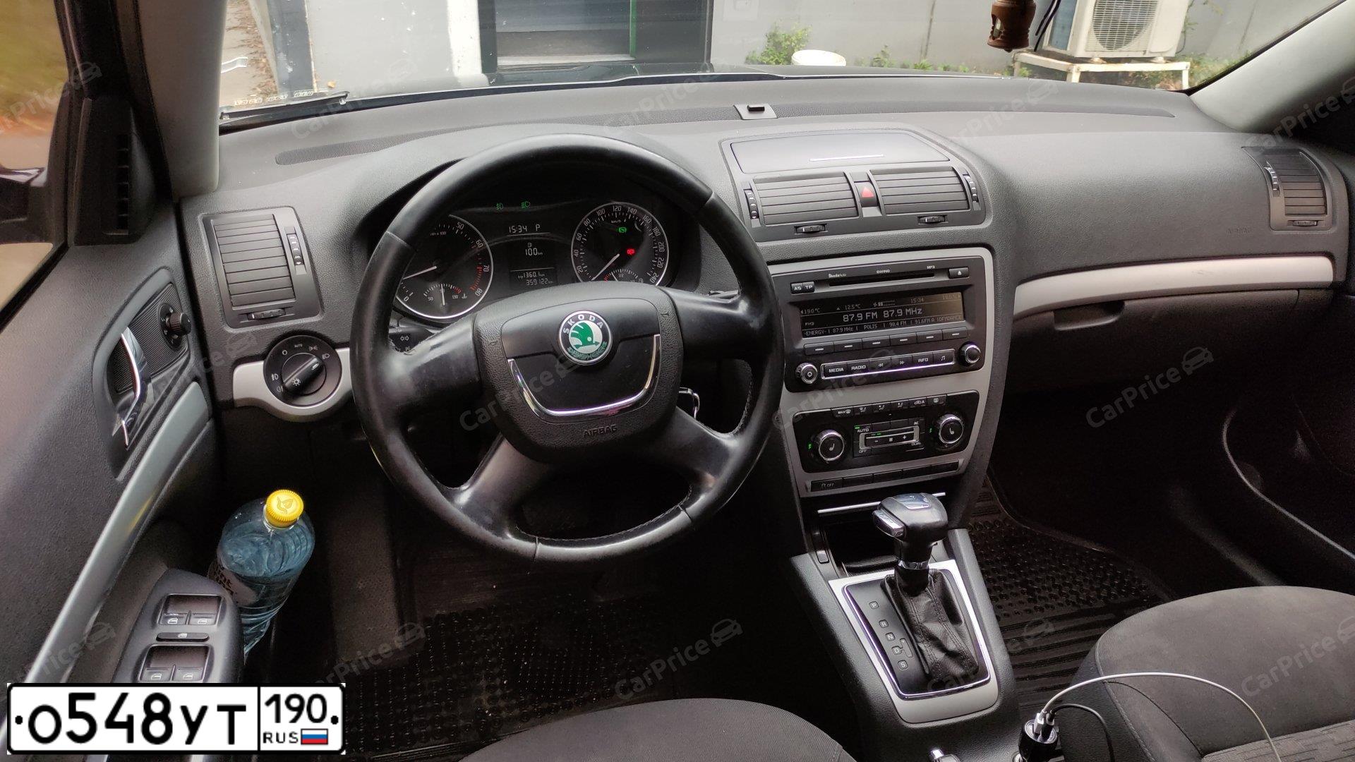 Фото автомобиля SKODA OCTAVIA, 2013 — госномер Т694ВН154. Цвет: ЧЕРНЫЙ
