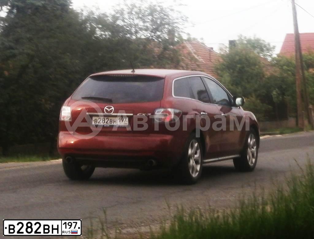 Фото автомобиля MAZDA CX-7, 2010 — госномер Р006МК761. Цвет: Красный