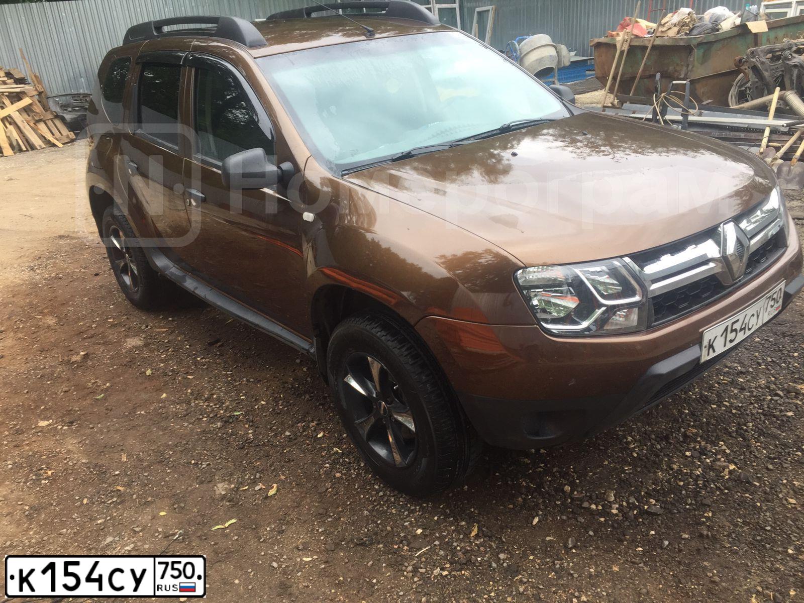 Фото автомобиля RENAULT DUSTER, 2013 — госномер К154СУ750. Цвет: Коричневый