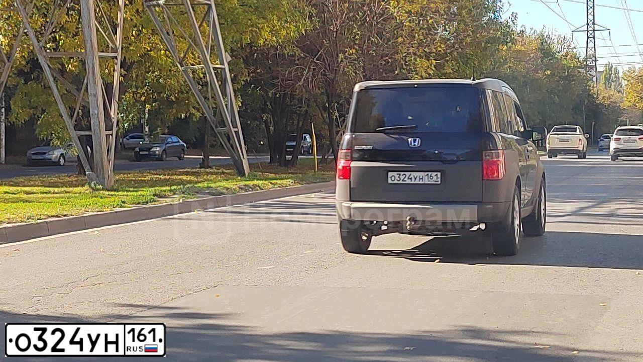 Фото автомобиля HONDA ELEMENT, 2004 — госномер О324УН161. Цвет: ЧЕРНЫЙ