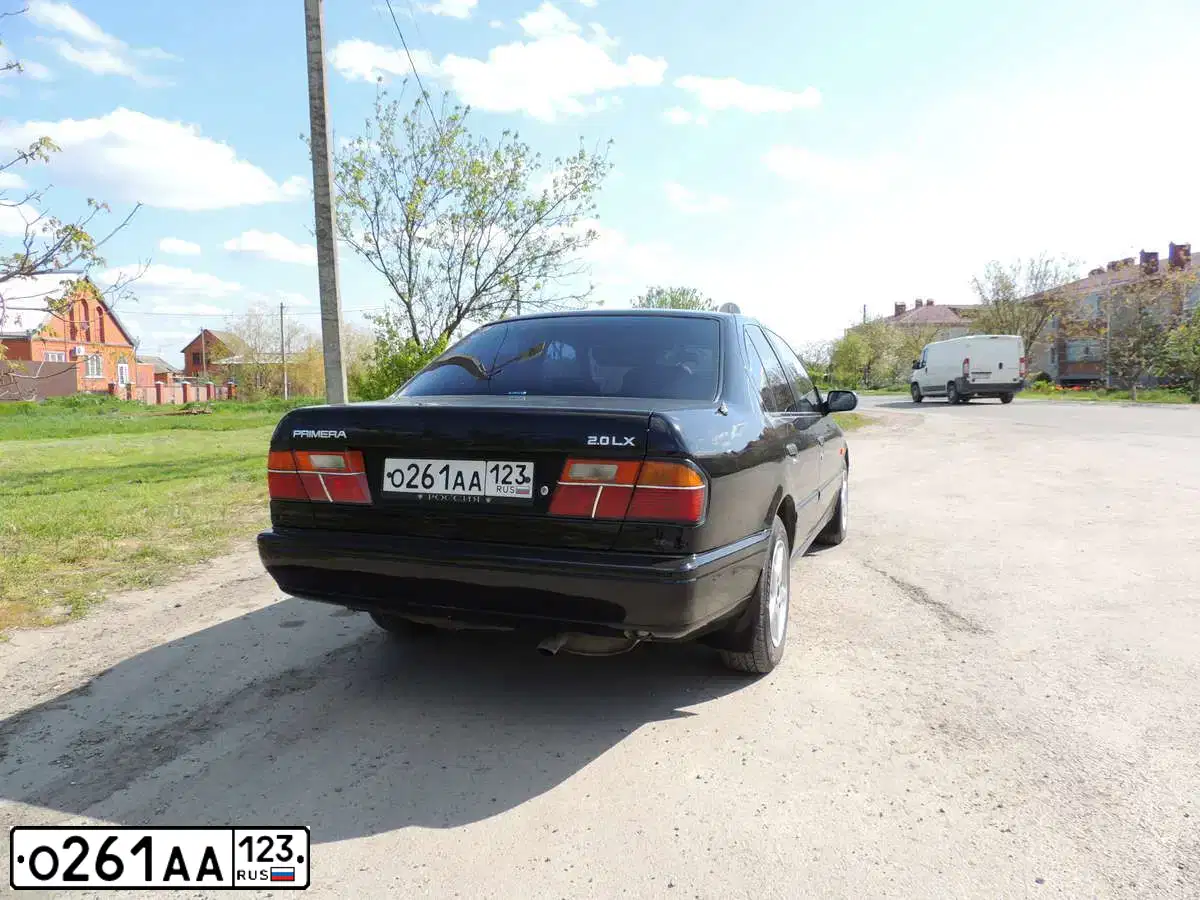 Фото автомобиля NISSAN PRIMERA, 1994 — госномер Х289МР36. Цвет: ЧЕРНЫЙ