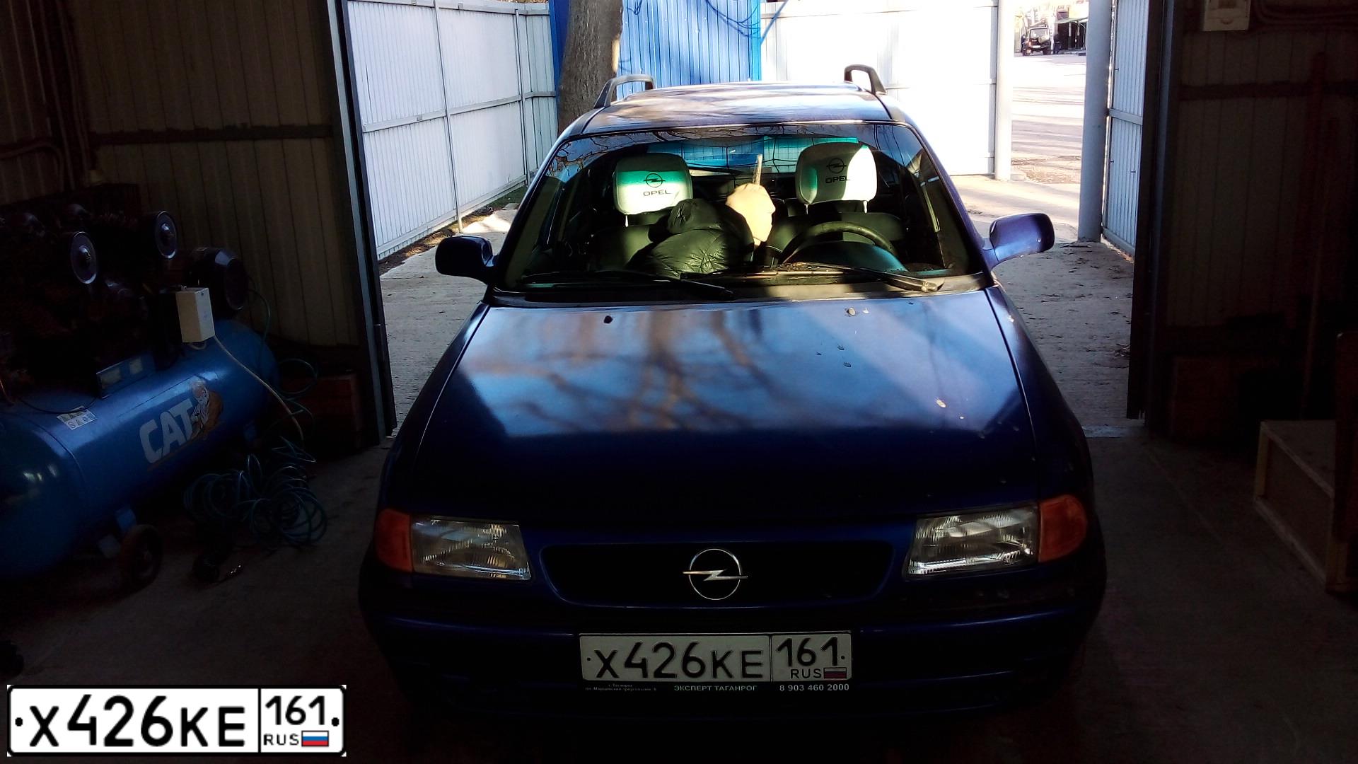Фото автомобиля OPEL ASTRA, 1997 — госномер М521ТК21. Цвет: синий