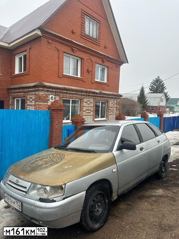 Фото автомобиля LADA 2112, 2003 — госномер Н086РЕ702. Цвет: СВЕТЛО-СЕРЕБРИСТЫЙ
