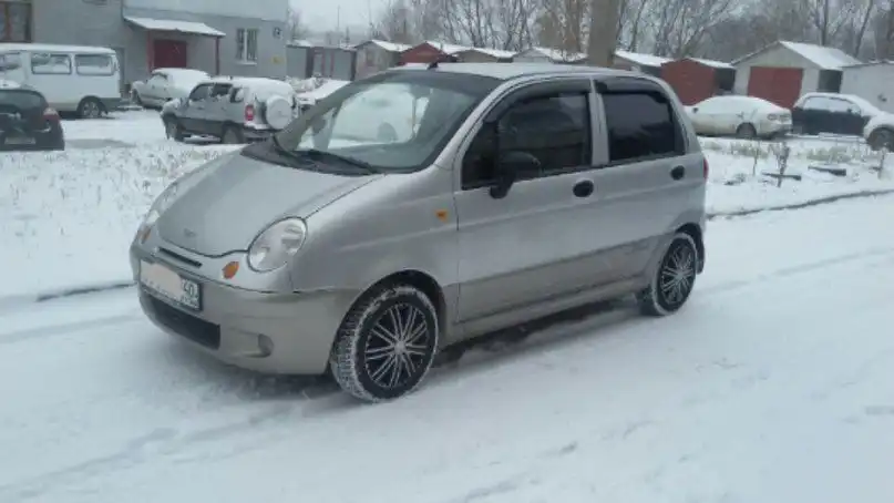 Фото автомобиля DAEWOO MATIZ, 2011 — госномер Н941НР40. Цвет: серебристый