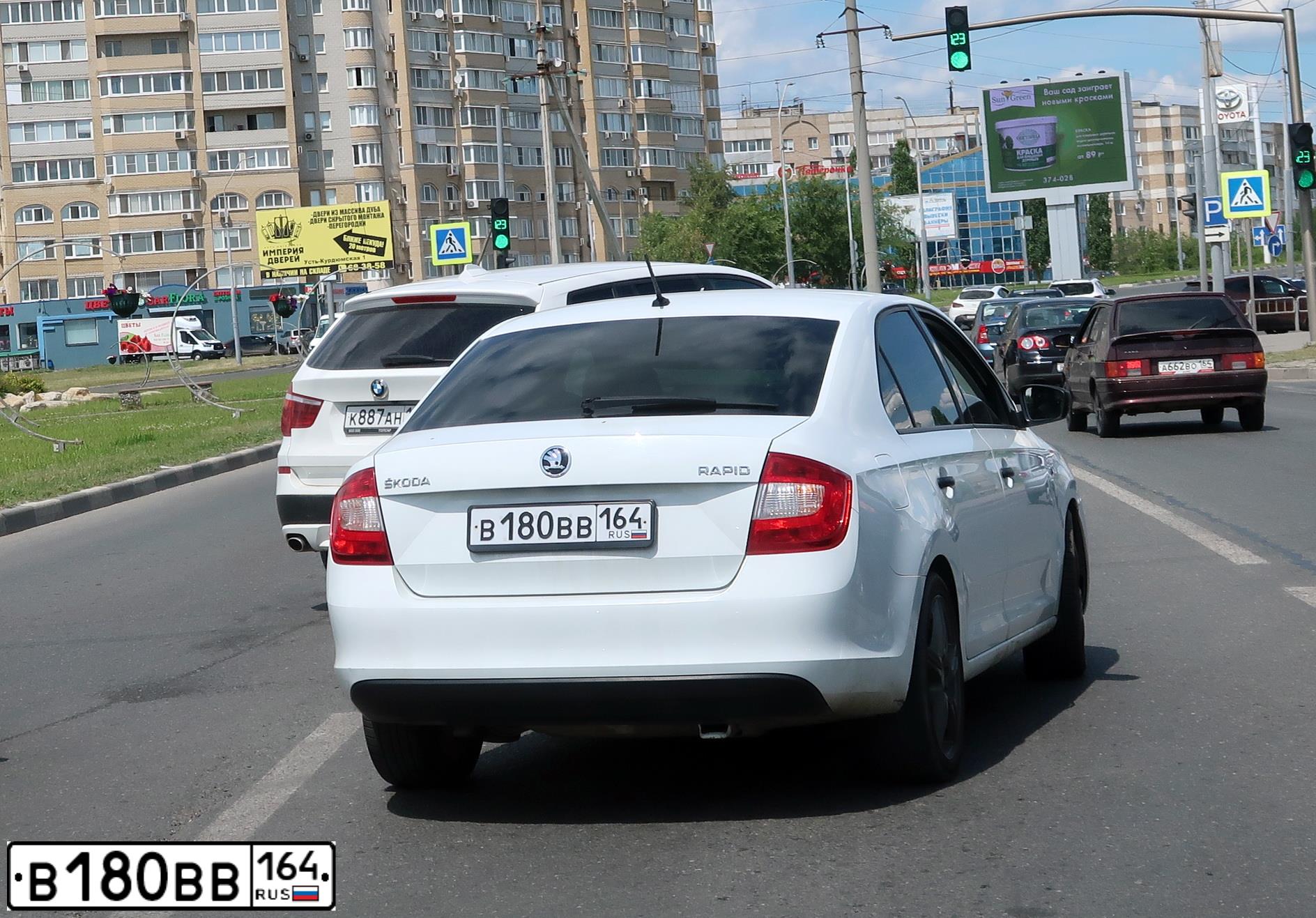Фото автомобиля SKODA RAPID, 2016 — госномер В180ВВ164. Цвет: Белый