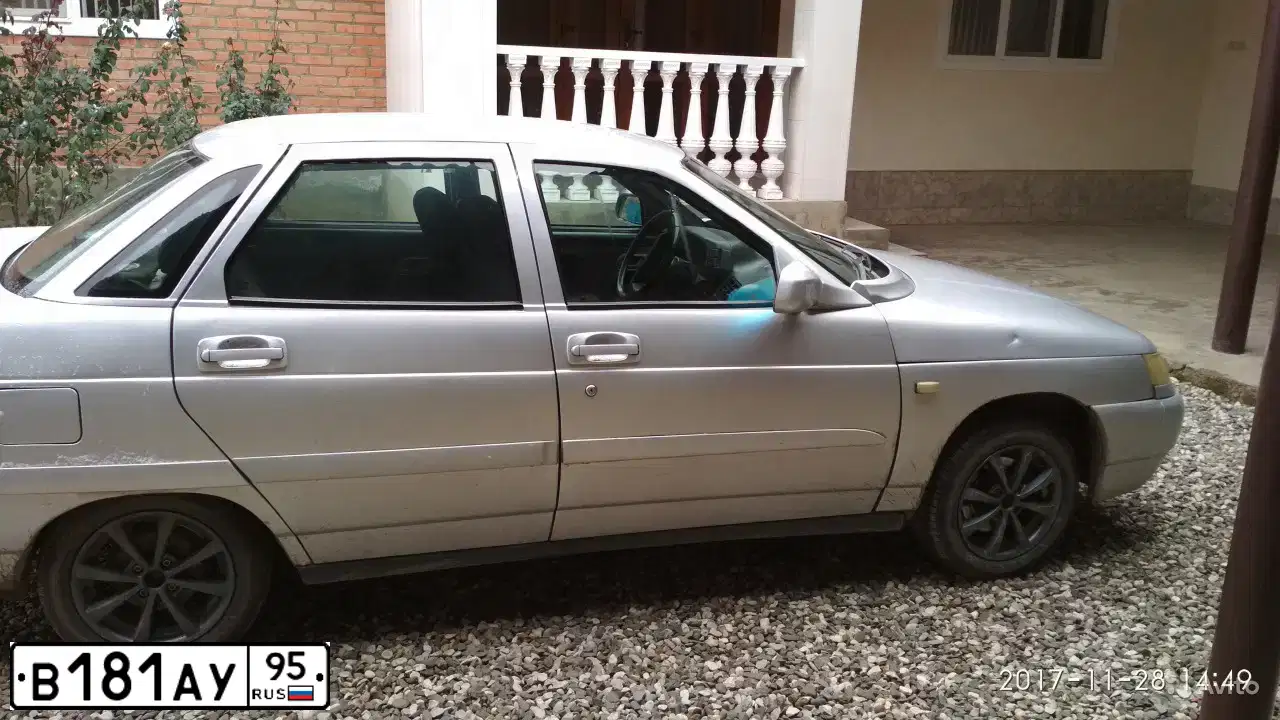 Фото автомобиля LADA 2110, 2005 — госномер Н156СТ15. Цвет: Белый
