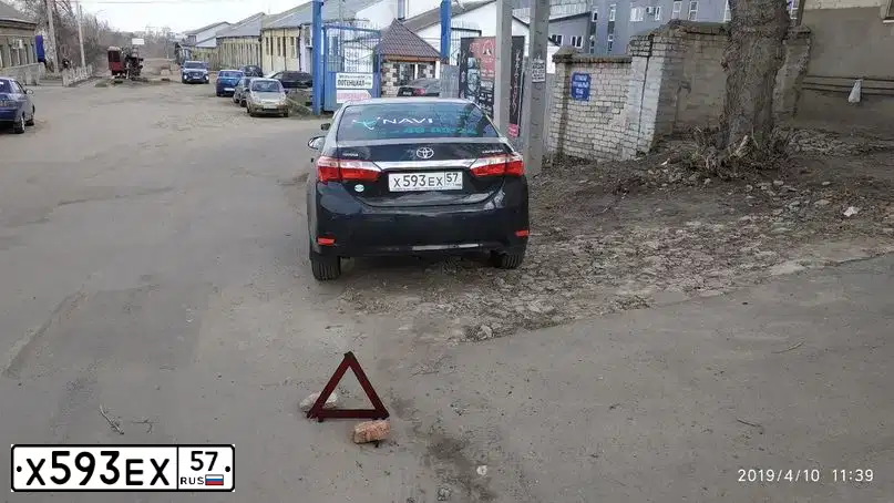 Фото автомобиля TOYOTA COROLLA, 2014 — госномер Х593ЕХ57. Цвет: ЧЕРНЫЙ