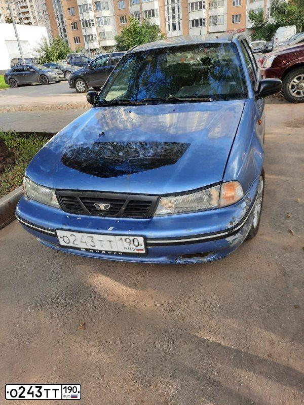 Фото автомобиля DAEWOO O NEXIA, 2007 — госномер О243ТТ190. Цвет: СИНИЙ