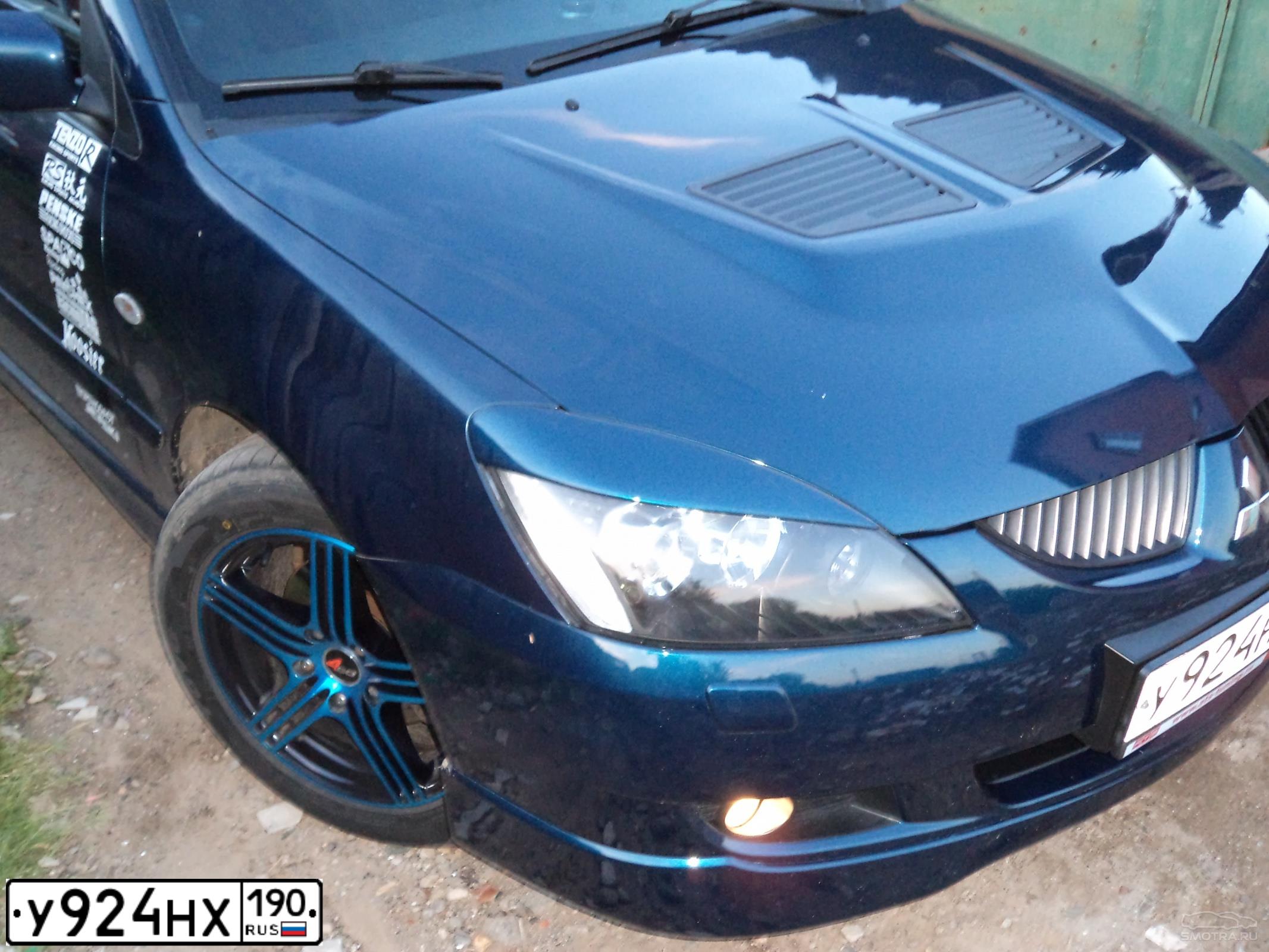 Фото автомобиля MITSUBISHI LANCER, 2004 — госномер К080КМ147. Цвет: синий