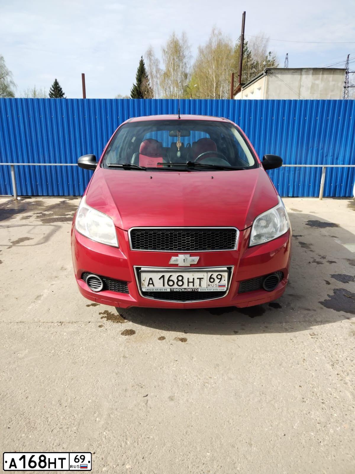 Фото автомобиля CHEVROLET AVEO, 2009 — госномер А168НТ69. Цвет: ТЕМНО-КРАСНЫЙ