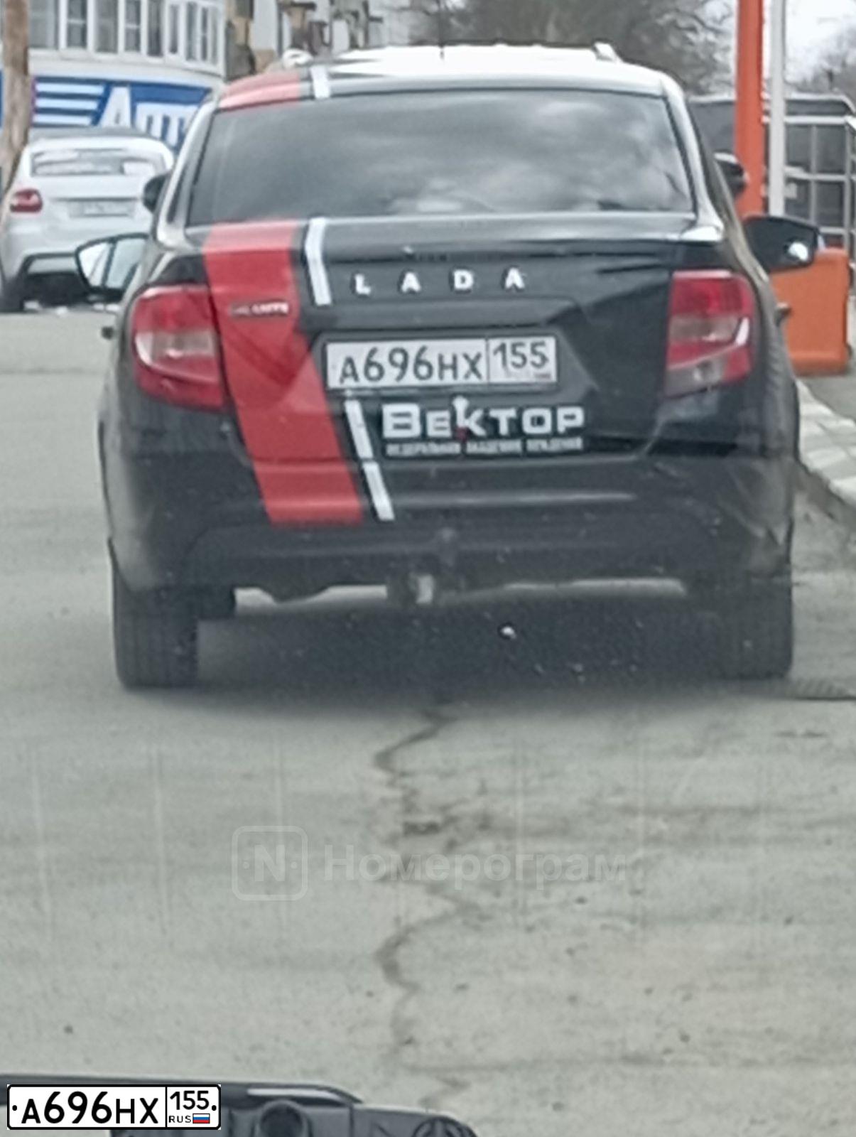Фото автомобиля VAZ LADA GRANTA, 2023 — госномер А696НХ155. Цвет: ЧЕРНЫЙ