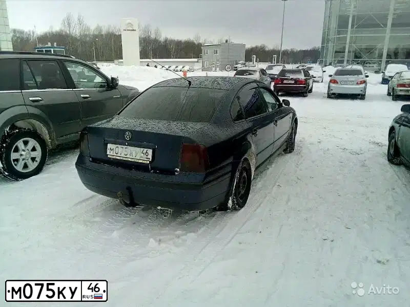 Фото автомобиля VOLKSWAGEN PASSAT, 1998 — госномер К110ЕЕ82. Цвет: ТЕМНО-СИНИЙ