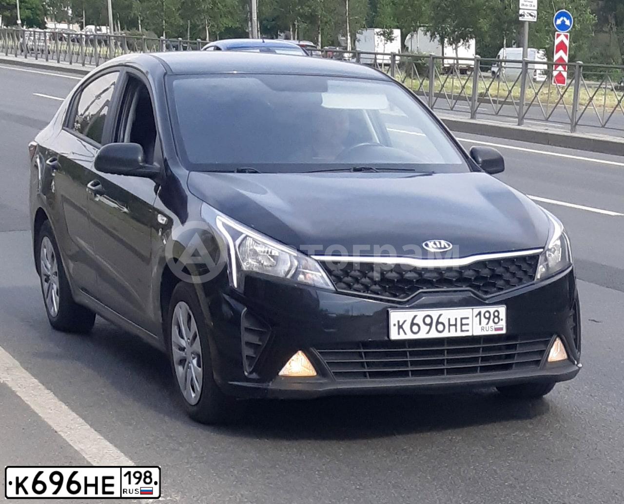 Фото автомобиля KIA RIO, 2020 — госномер М018ХУ35. Цвет: ЧЕРНЫЙ