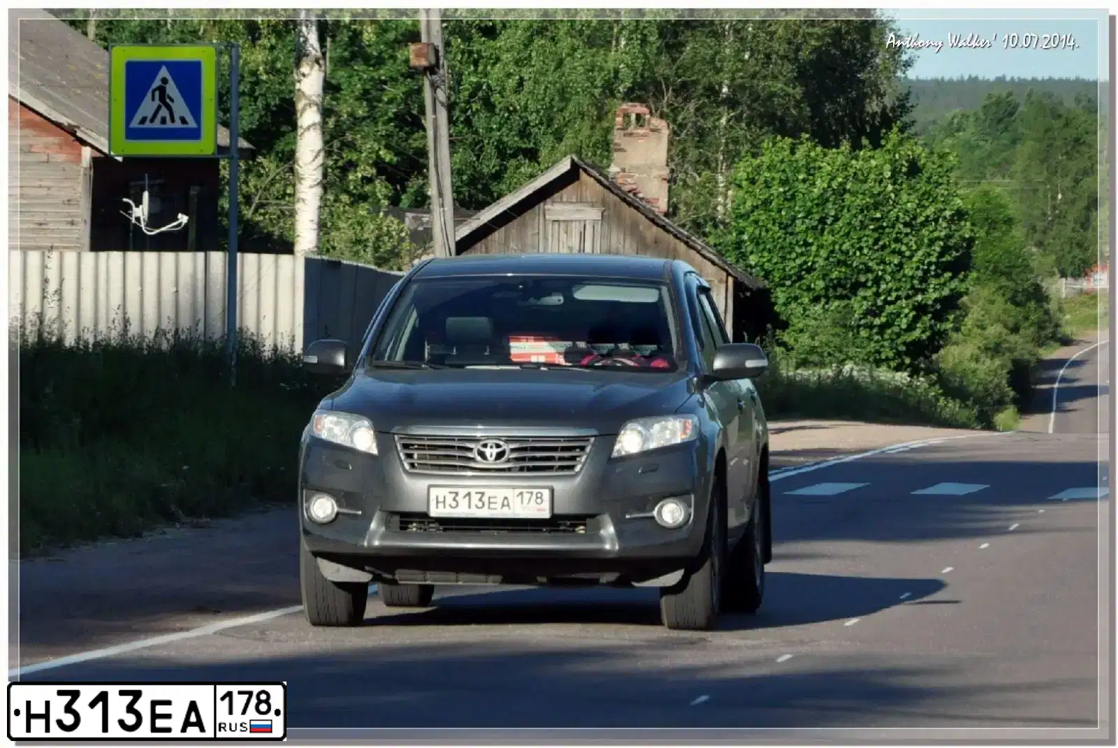 Фото автомобиля TOYOTA RAV4, 2012 — госномер Н313ЕА178. Цвет: Серый