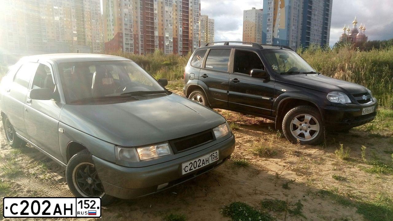Фото автомобиля LADA 2112 LADA, 2007 — госномер С202АН152. Цвет: СЕРО-ЗЕЛЕНЫЙ