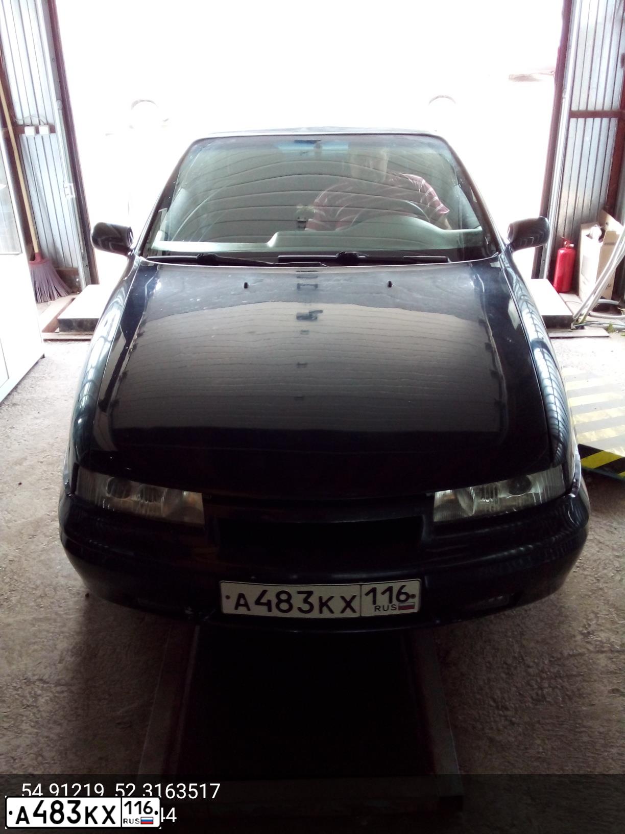 Фото автомобиля OPEL CALIBRA, 1991 — госномер Е125НМ763. Цвет: ЧЕРНЫЙ