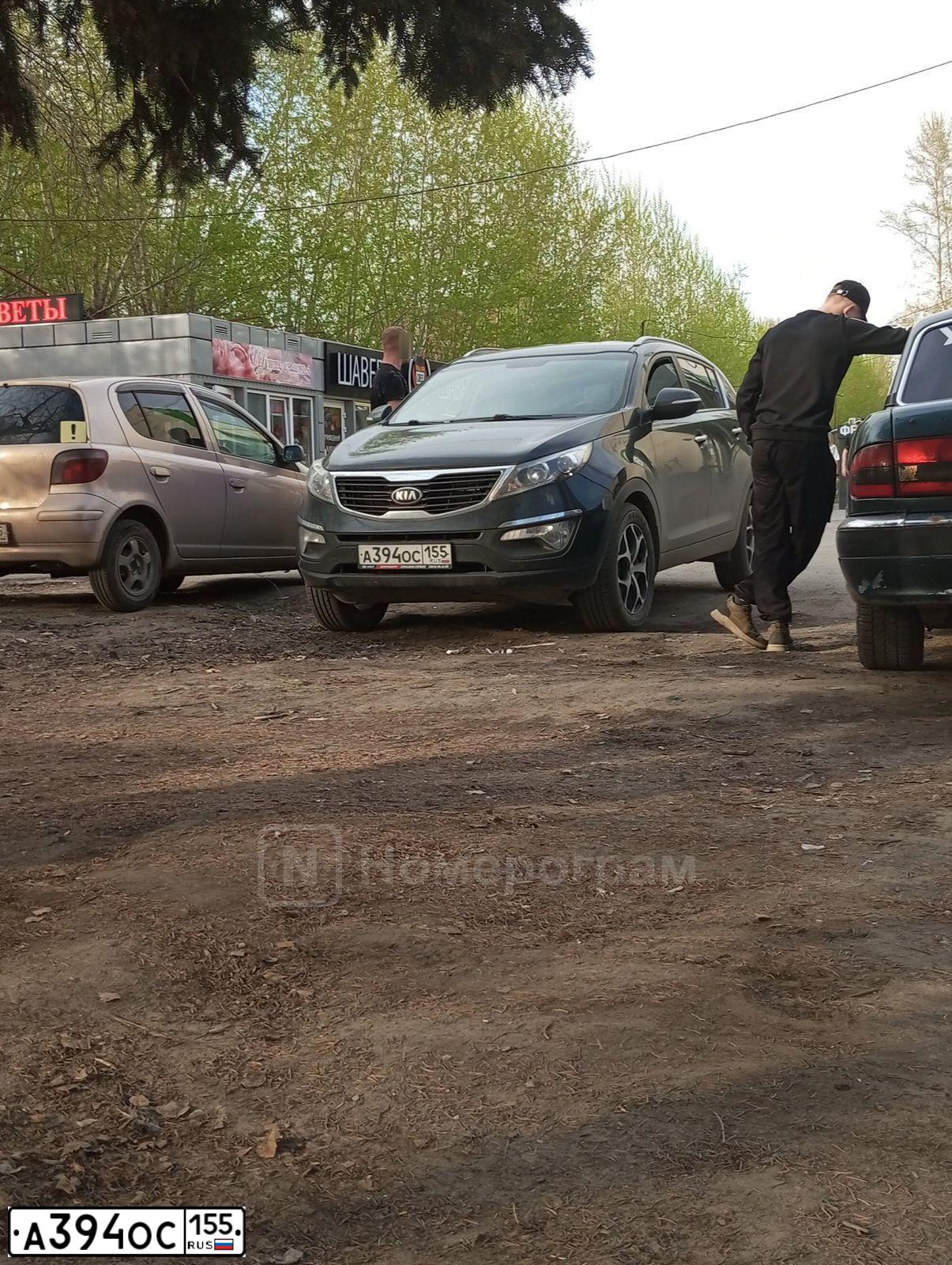 Фото автомобиля KIA SPORTAGE, 2012 — госномер О207ОО55. Цвет: ЧЕРНЫЙ