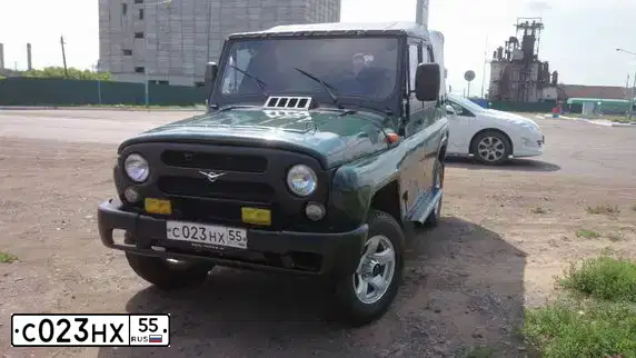 Фото автомобиля CHEVROLET NIVA, 2005 — госномер С032НХ55. Цвет: ЧЕРНЫЙ МЕТАЛИК