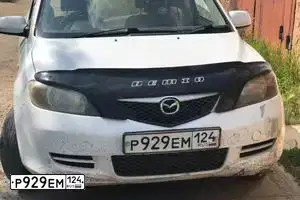 Фото автомобиля MAZDA DEMIO, 2003 — госномер Р929ЕМ124