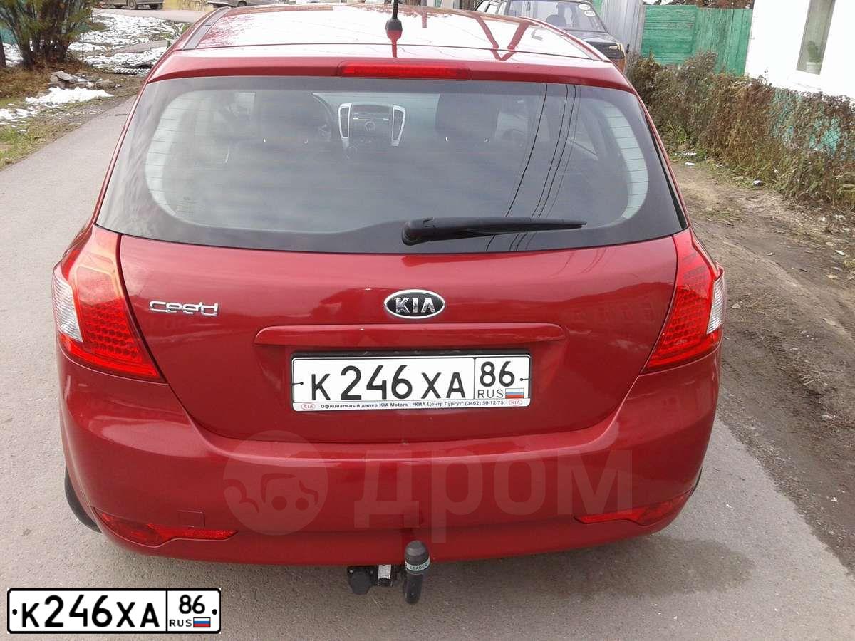 Фото автомобиля KIA CEE'D, 2010 — госномер К246ХА86. Цвет: КРАСНЫЙ