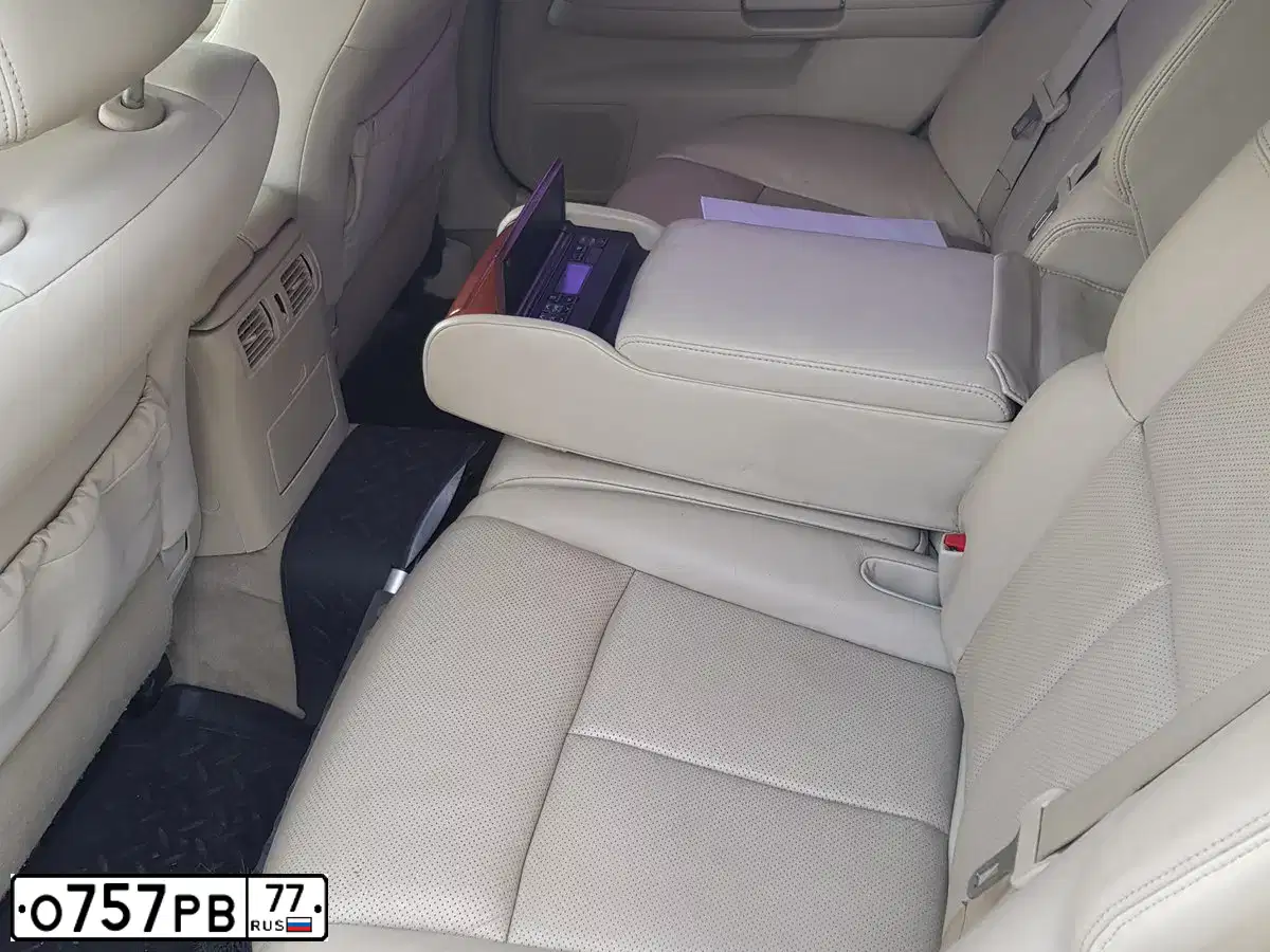Фото автомобиля VOLKSWAGEN TIGUAN, 2013 — госномер О757РВ77. Цвет: ТЕМНО-СИНИЙ