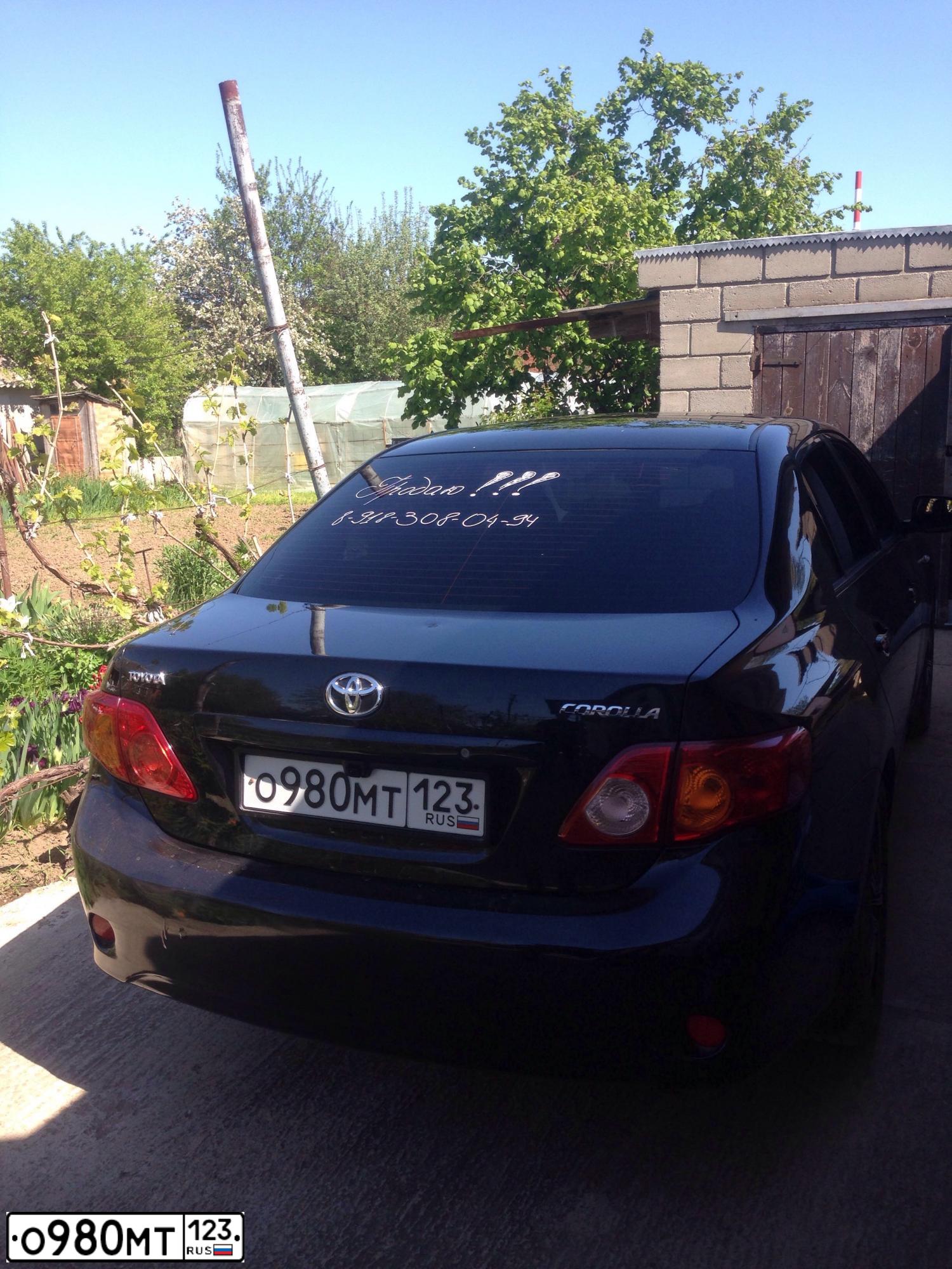 Фото автомобиля TOYOTA COROLLA, 2007 — госномер О980МТ123. Цвет: ЧЕРНЫЙ