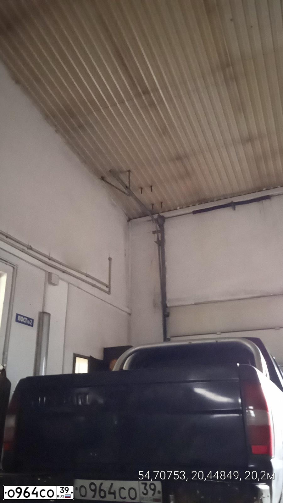 Фото автомобиля NISSAN NAVARA, 1999 — госномер О964СО39. Цвет: ЧЕРНЫЙ