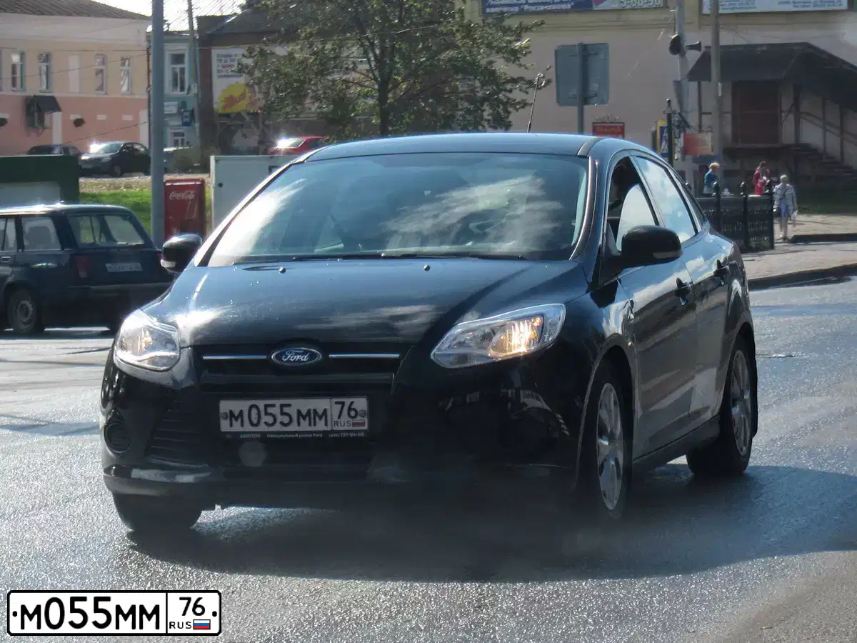 Фото автомобиля ФОРД FОСUS, 2013 — госномер М055ММ76. Цвет: ЧЕРНЫЙ