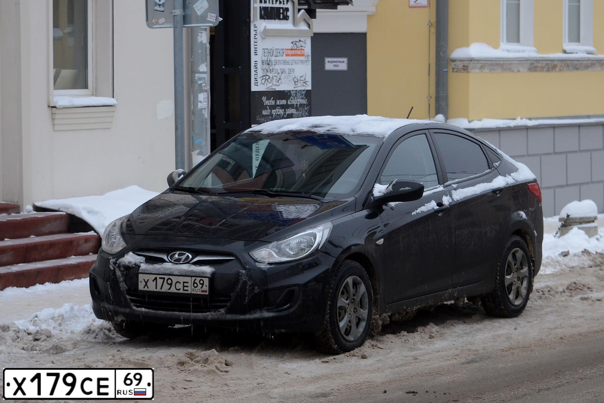 Фото автомобиля HYUNDAI SOLARIS, 2014 — госномер Х179СЕ69. Цвет: ЧЕРНЫЙ