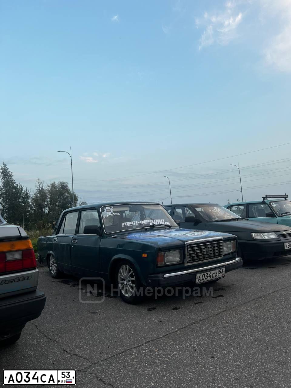 Фото автомобиля LADA 2107, 2002 — госномер А034СА53. Цвет: сине-зеленый